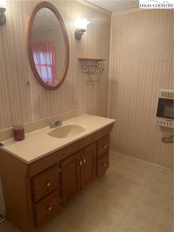 294 Walter Blevins Road Lansing, NC 28643 - Photo 9 of 15 a bathroom with a sink and a mirror