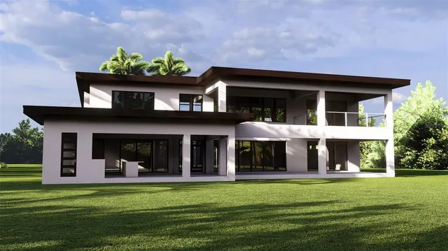 a view of a brick house with a swimming pool and a table and chairs