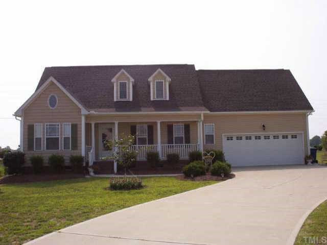 4816 Kure Road Raleigh, NC 27603 - Photo 1 of 1 Front. Rocking chair front porch, two car garage, cul-de-sac lot, vinyl siding. Exterior Front