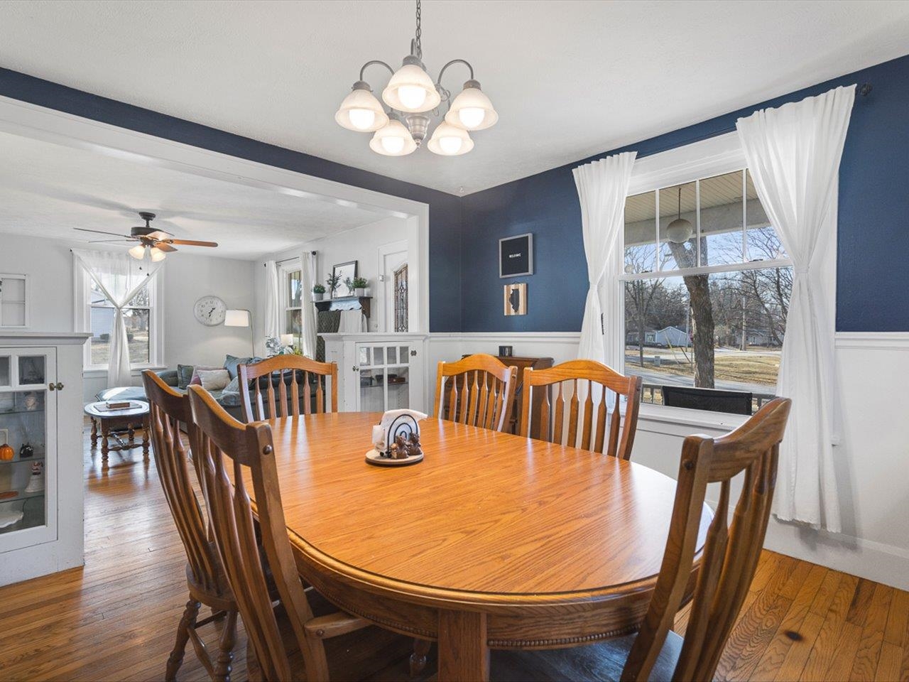 239 South Walnut Street Stillman Valley, IL 61084 - Photo 11 of 42 a view of a dining room with furniture window and wooden floor