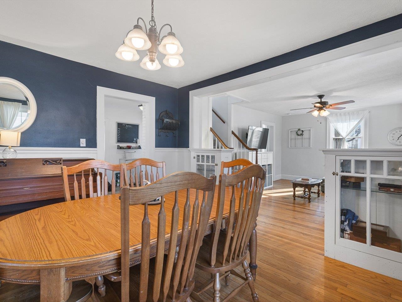 239 South Walnut Street Stillman Valley, IL 61084 - Photo 12 of 42 a view of a dining room with furniture and wooden floor