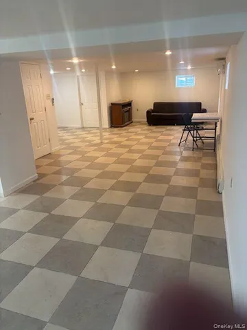 a lobby with table and chairs