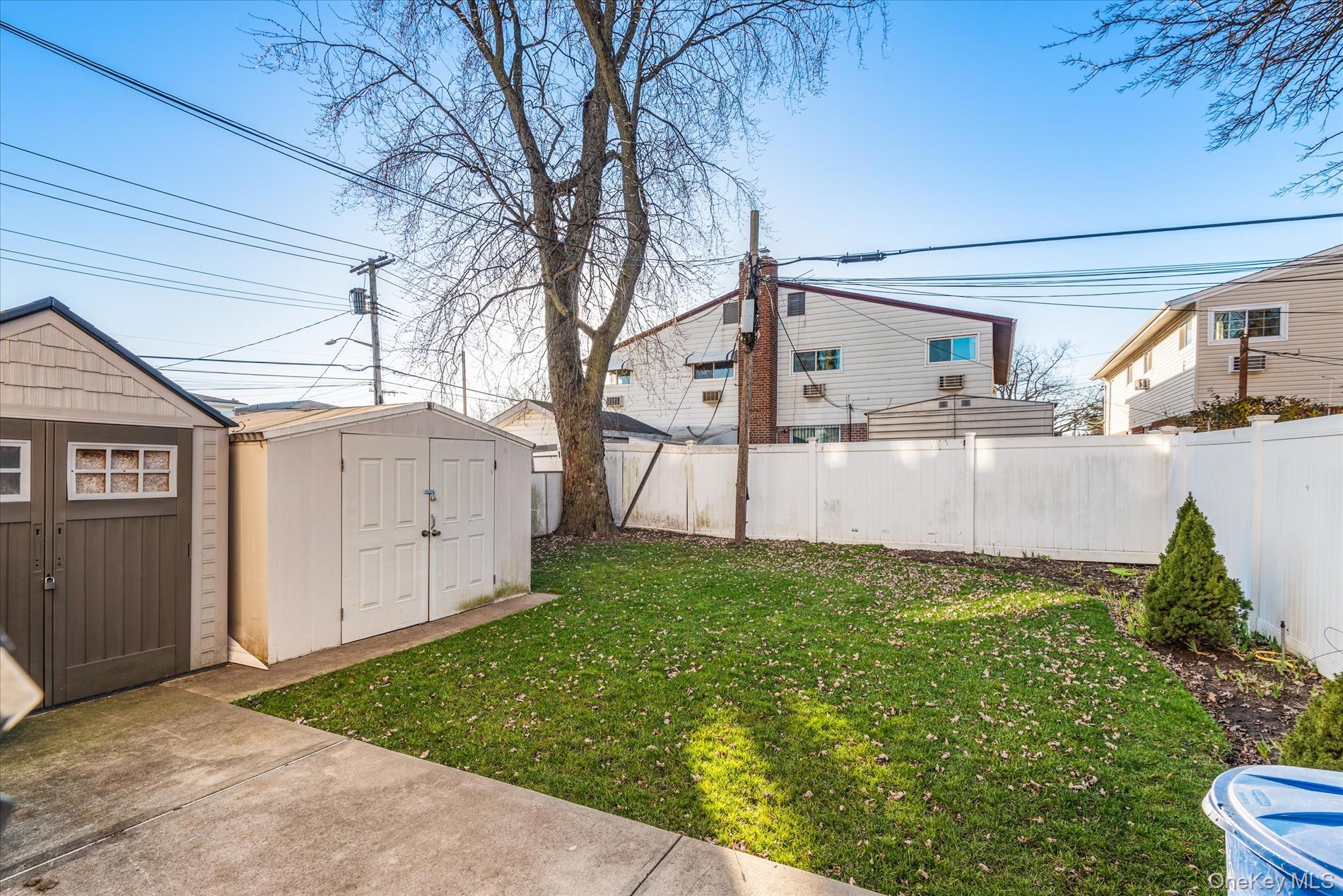 151-42 82nd Street Queens, NY 11414 - Photo 21 of 24 a view of a back yard of the house