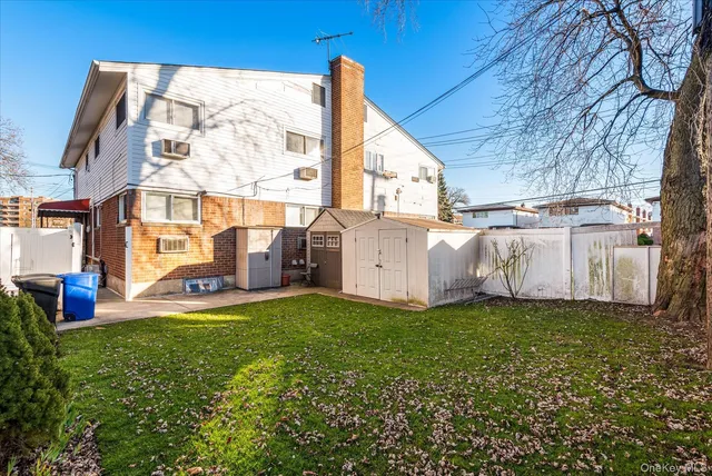 a view of a back yard of the house