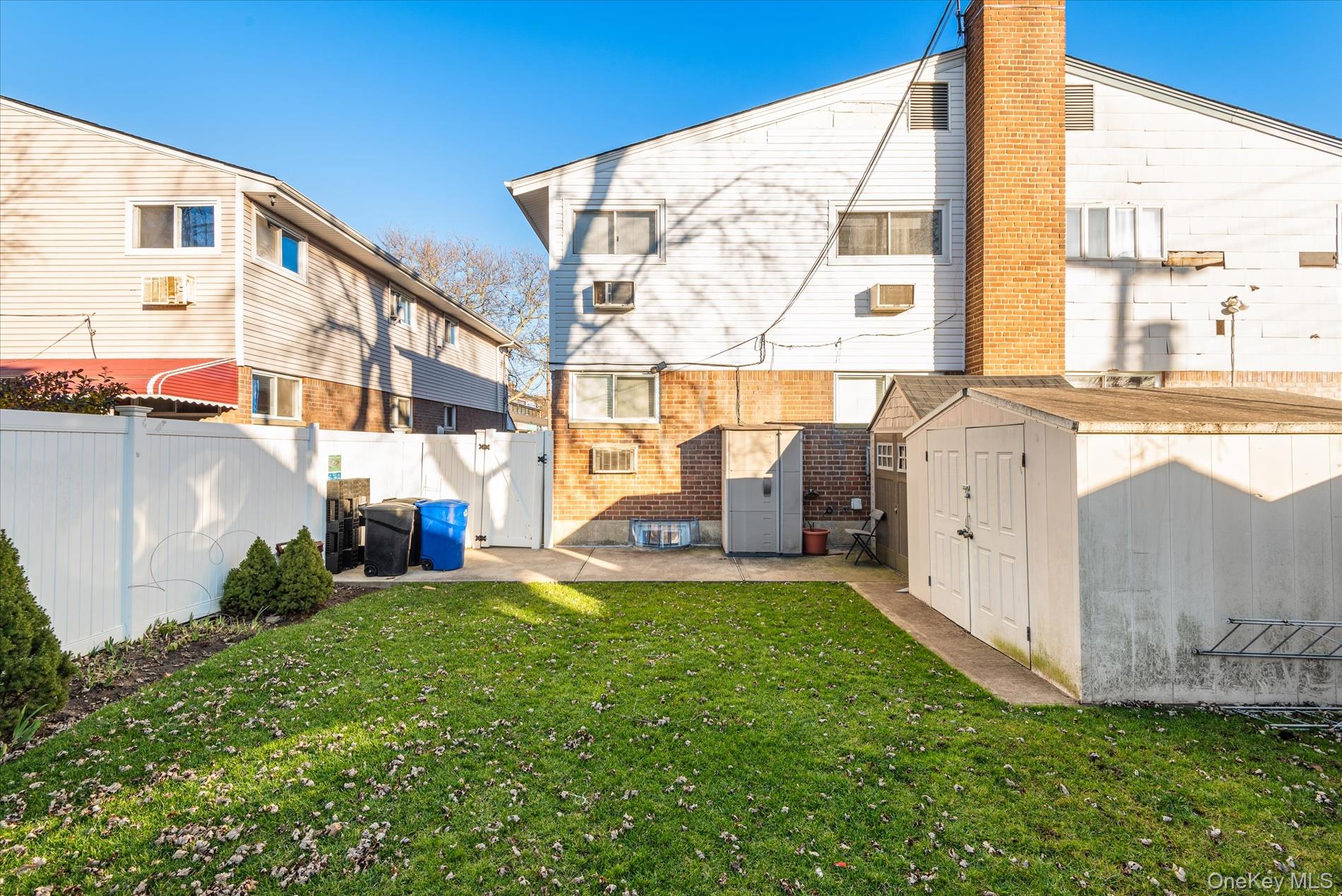 151-42 82nd Street Queens, NY 11414 - Photo 23 of 24 a view of a back yard of the house