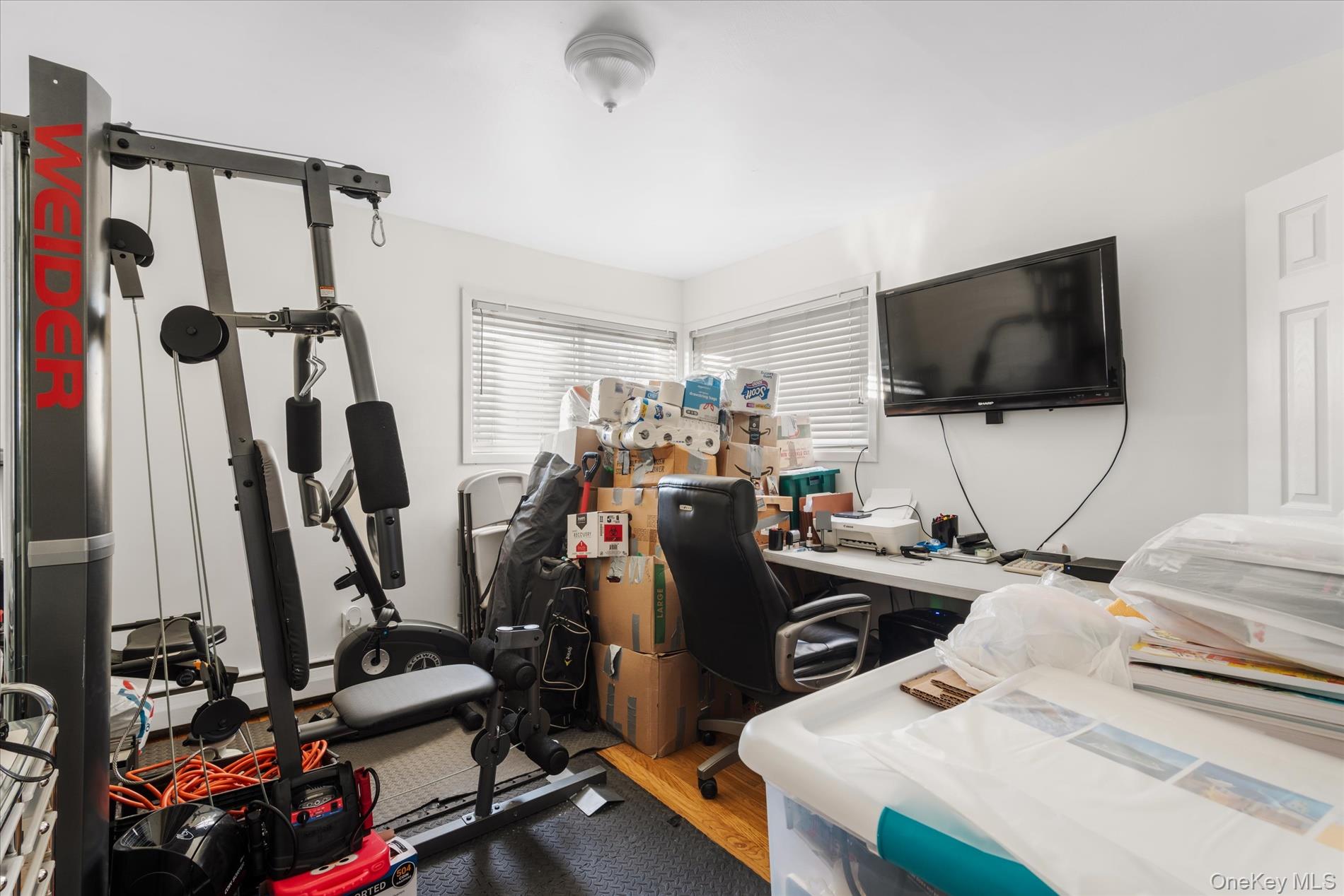 151-42 82nd Street Queens, NY 11414 - Photo 8 of 24 a view of a room with gym equipment