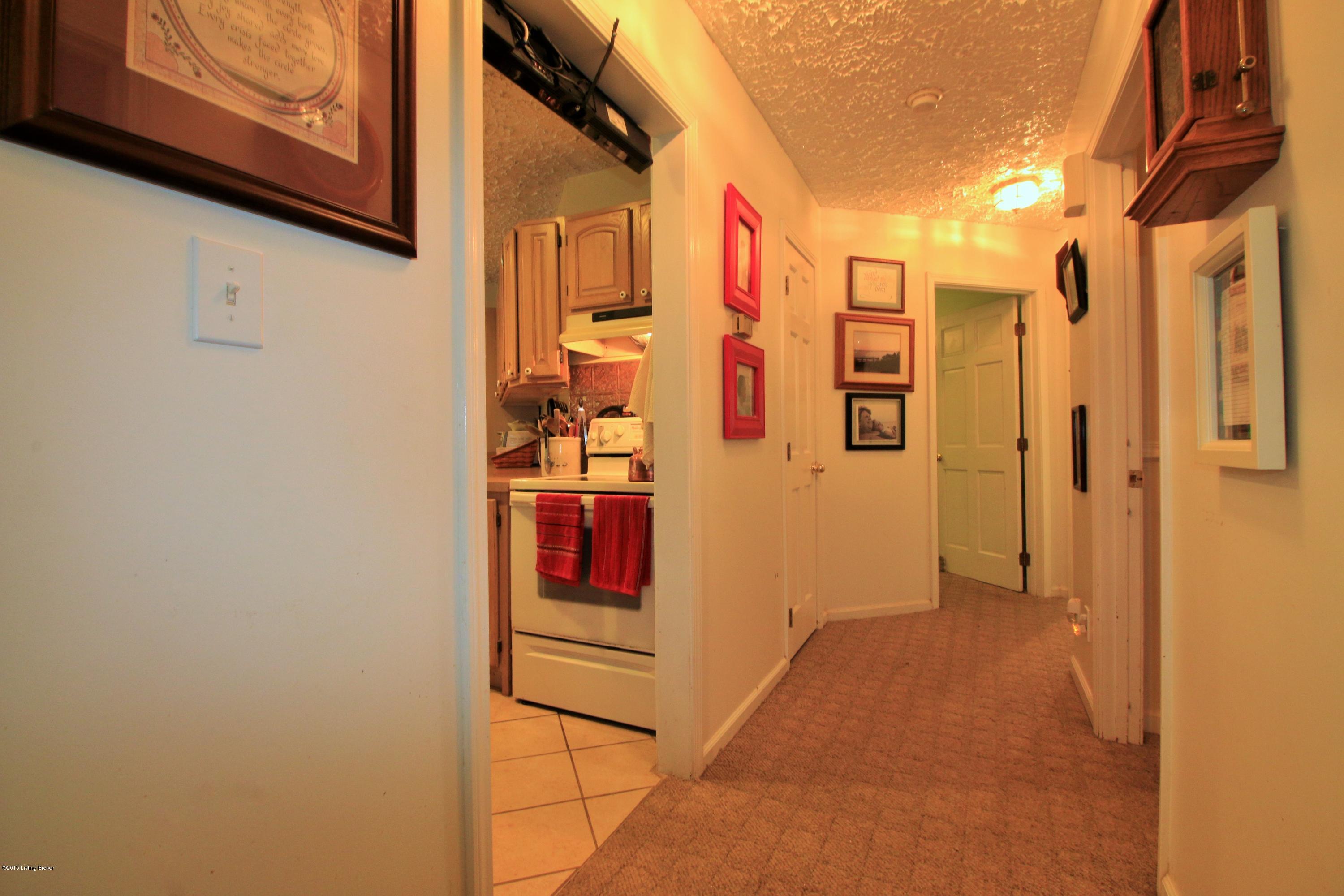 106 Callis Grove Pendleton, KY 40055 - Photo 19 of 36 The home’s hallway is brightened with overhead lighting and houses the second full bathroom.