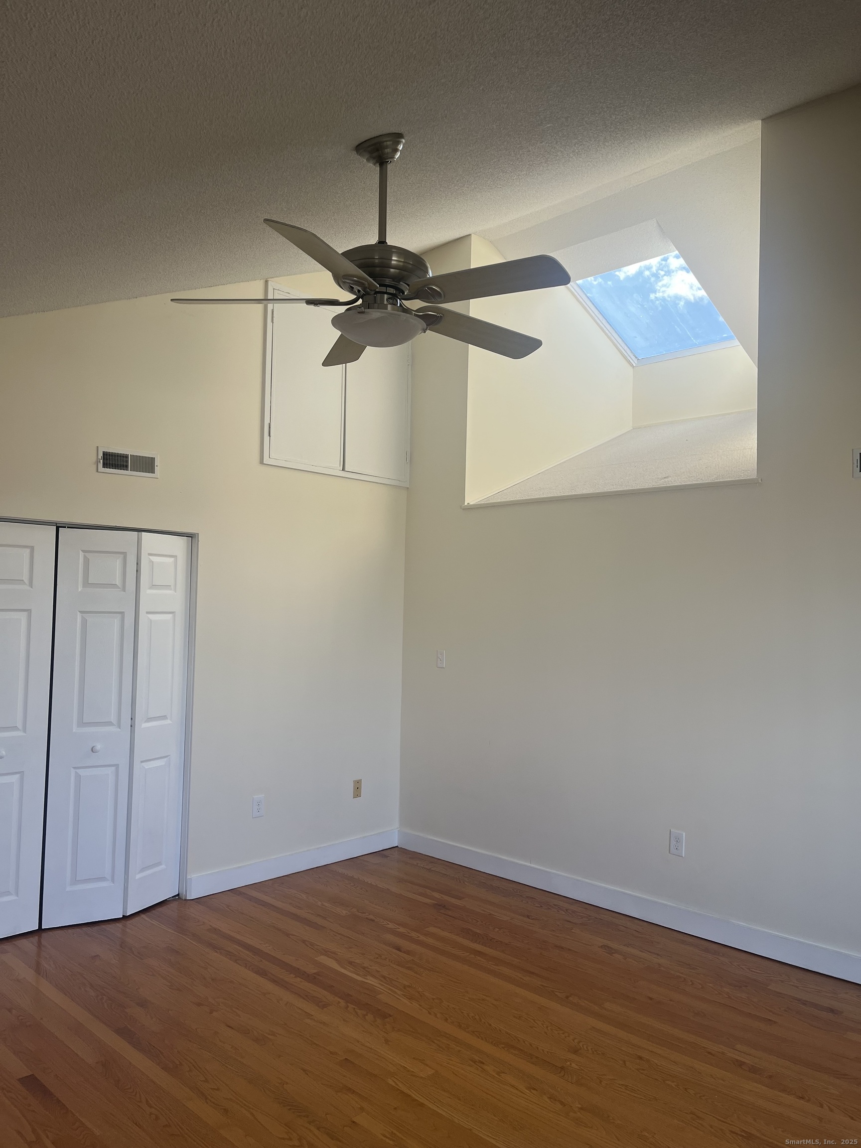 896 Quinnipiac Avenue, Unit 3 New Haven, CT 06513 - Photo 17 of 38 a view of a room with wooden floor