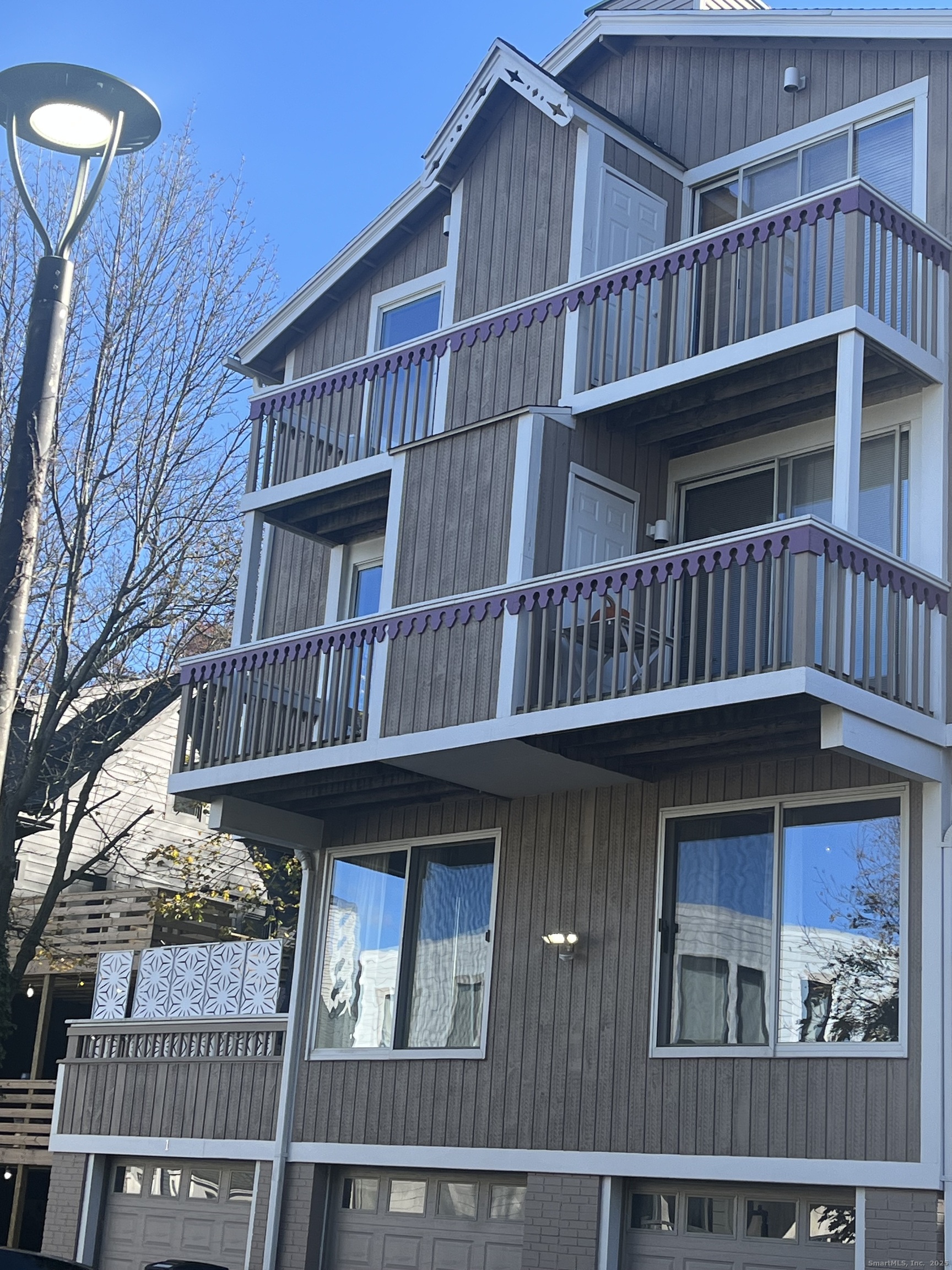 896 Quinnipiac Avenue, Unit 3 New Haven, CT 06513 - Photo 35 of 38 a view of a balcony with door