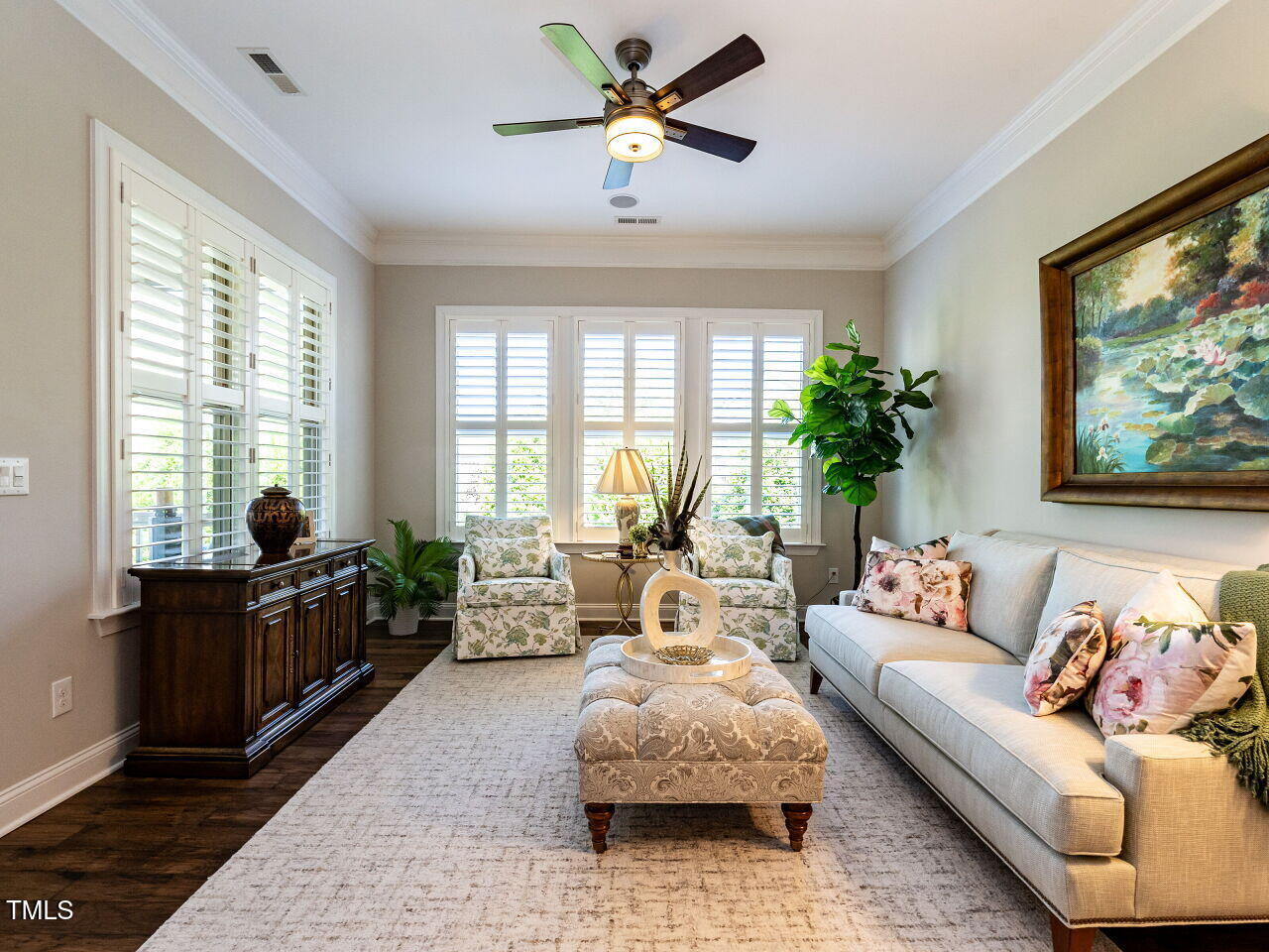 8461 Lentic Court Raleigh, NC 27615 - Photo 16 of 37 Hardwood floors, plantation shutters make this a tranquil, light-filled sanctuary.