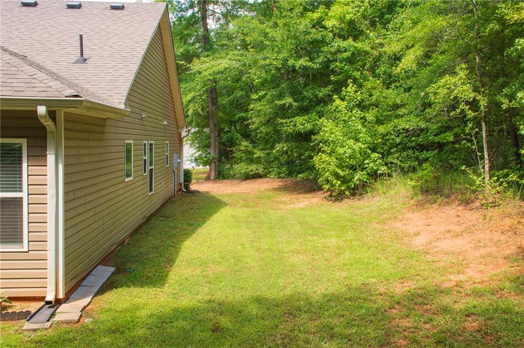 165 Pine Ridge Road Covington, GA 30016 - Photo 28 of 28 a view of a backyard