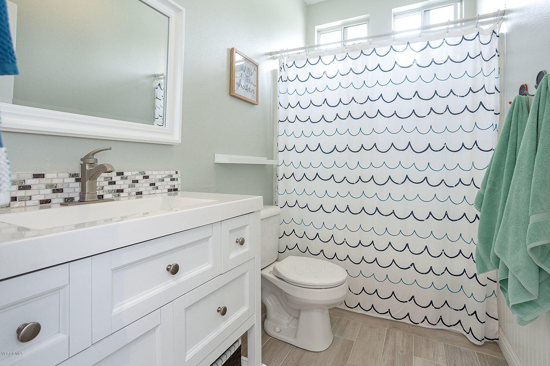4251 Rusticview Court Moorpark, CA 93021 - Photo 16 of 27 a bathroom with a sink toilet and shower