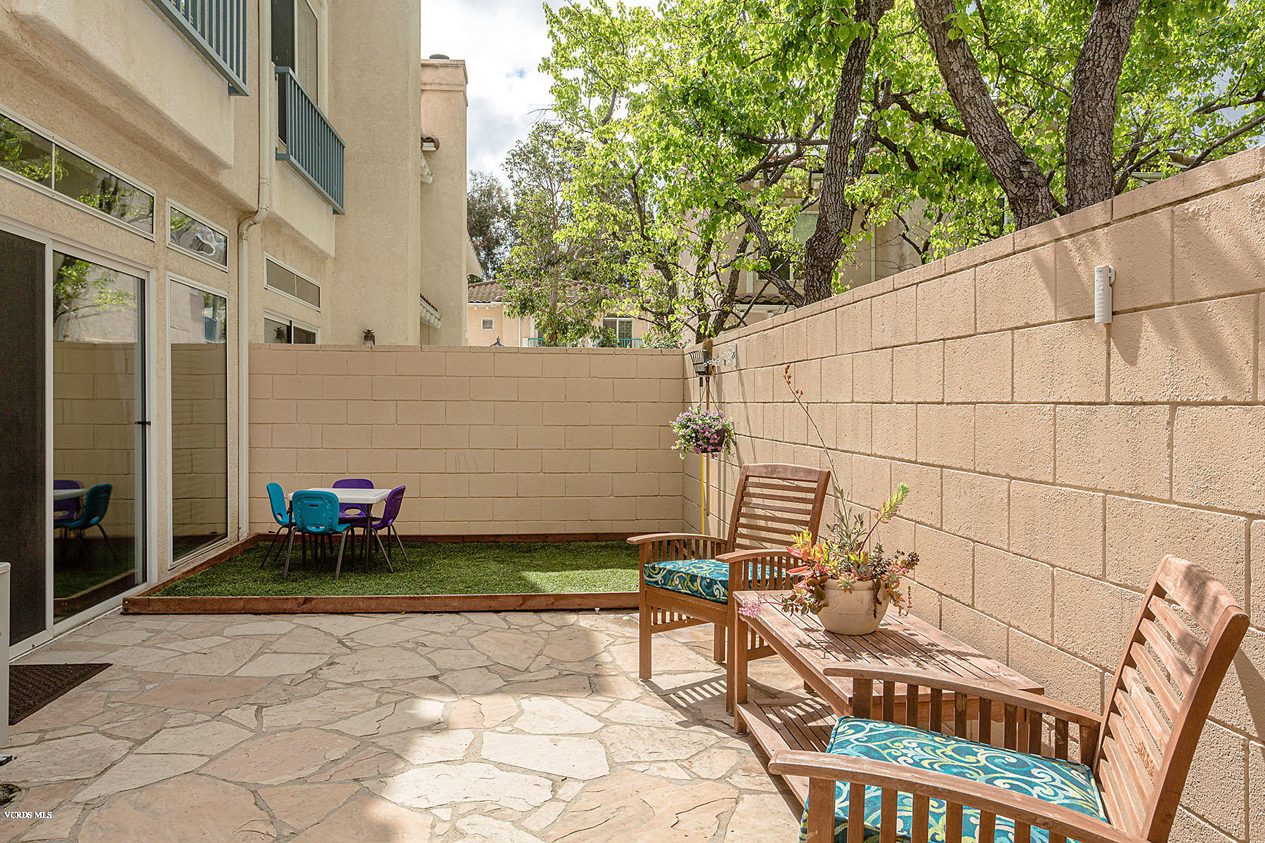 4251 Rusticview Court Moorpark, CA 93021 - Photo 20 of 27 a backyard of a house with outdoor seating