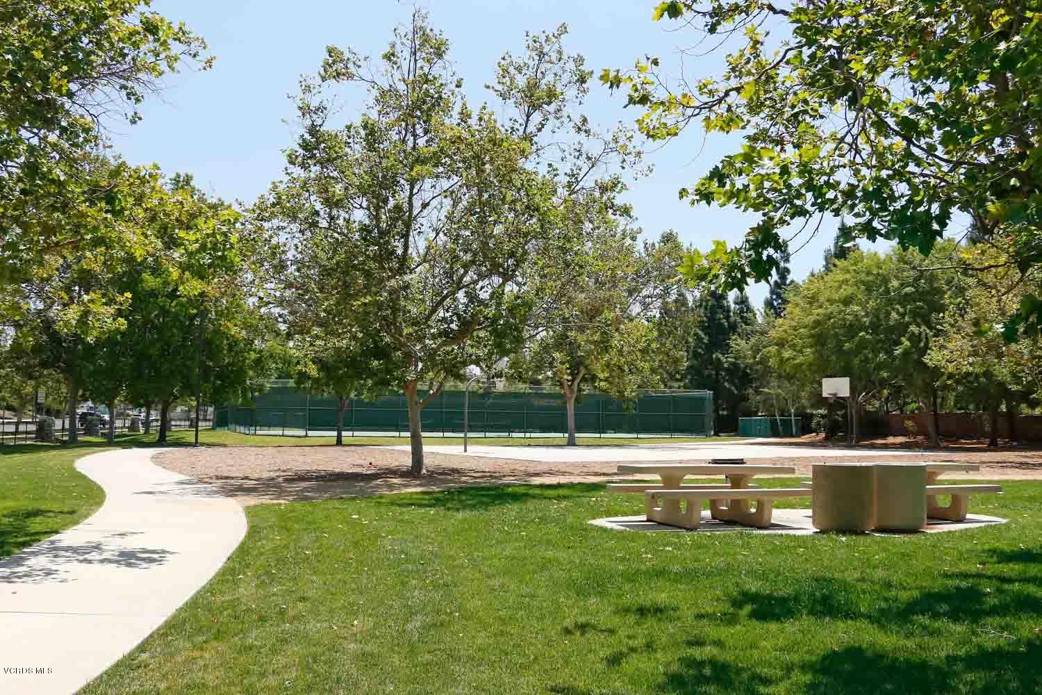 4251 Rusticview Court Moorpark, CA 93021 - Photo 25 of 27 a view of a swimming pool with a yard