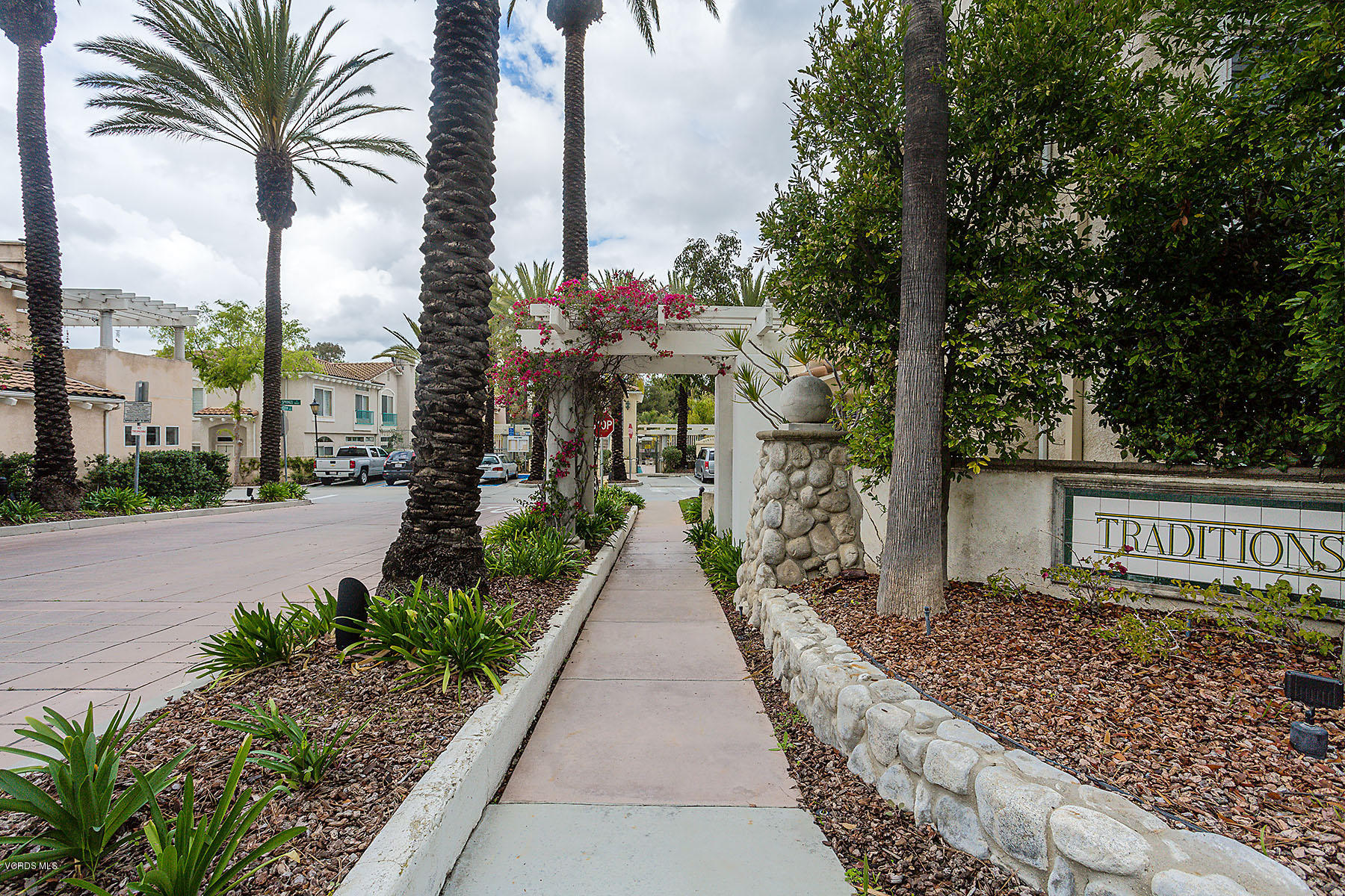 4251 Rusticview Court Moorpark, CA 93021 - Photo 26 of 27 a view of a pathway with a potted plants