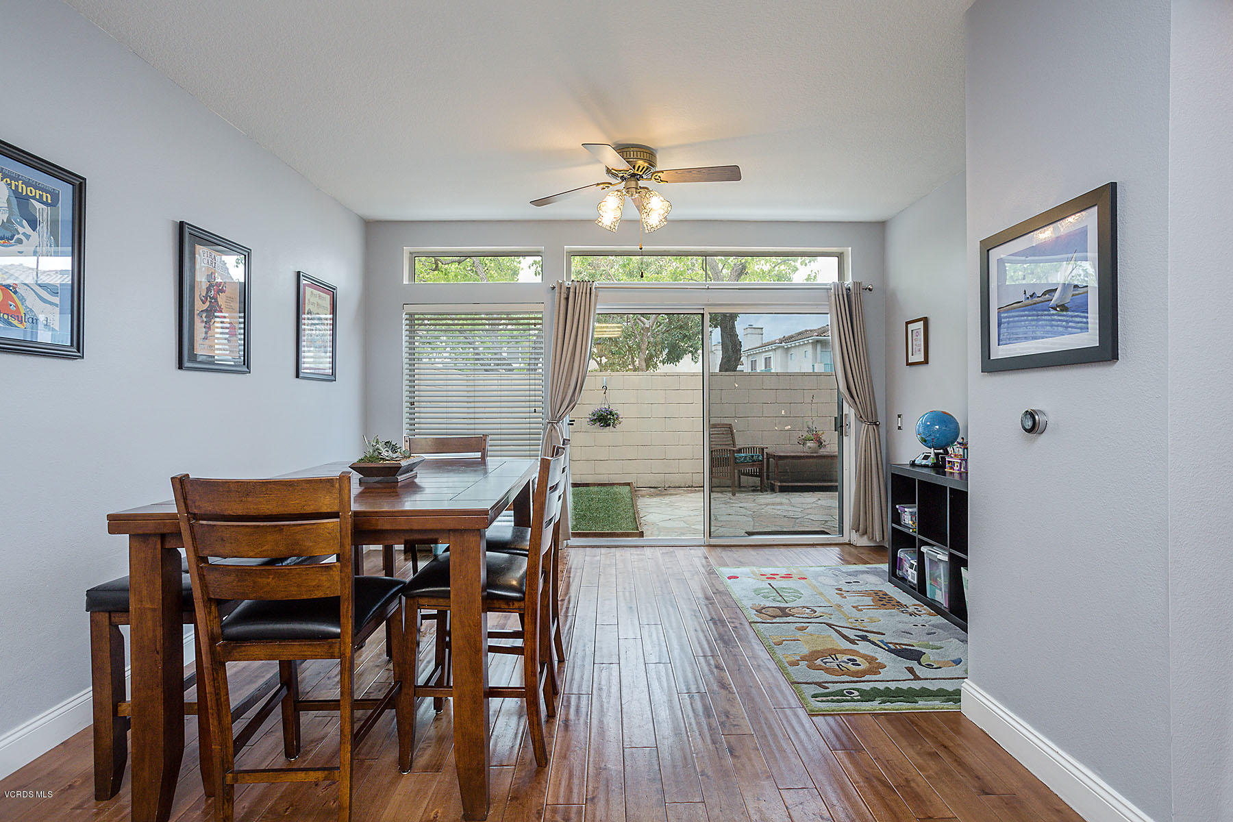 4251 Rusticview Court Moorpark, CA 93021 - Photo 9 of 27 a view of a dining room with furniture window and wooden floor
