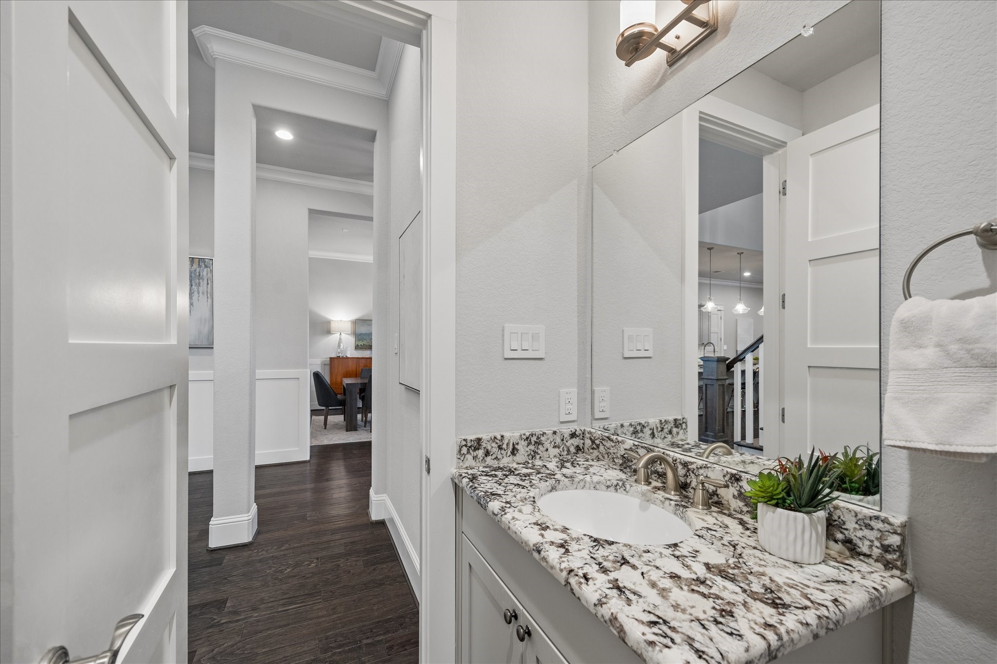 2223 Blue Duck Lane Conroe, TX 77384 - Photo 18 of 38 a bathroom with a sink and a mirror