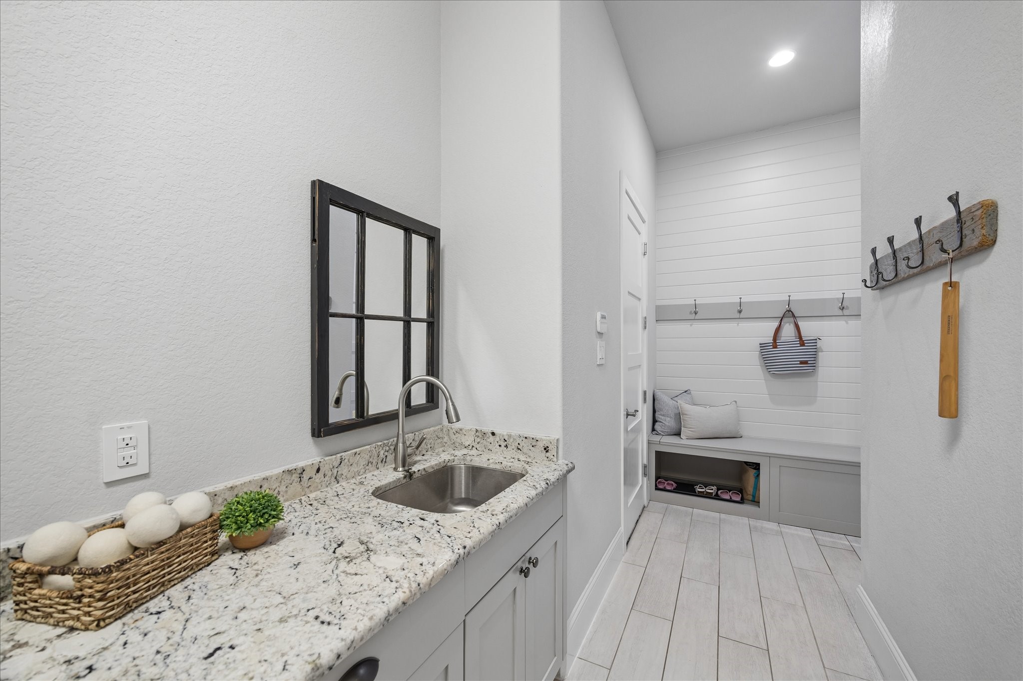 2223 Blue Duck Lane Conroe, TX 77384 - Photo 19 of 38 a bathroom with a sink and a mirror