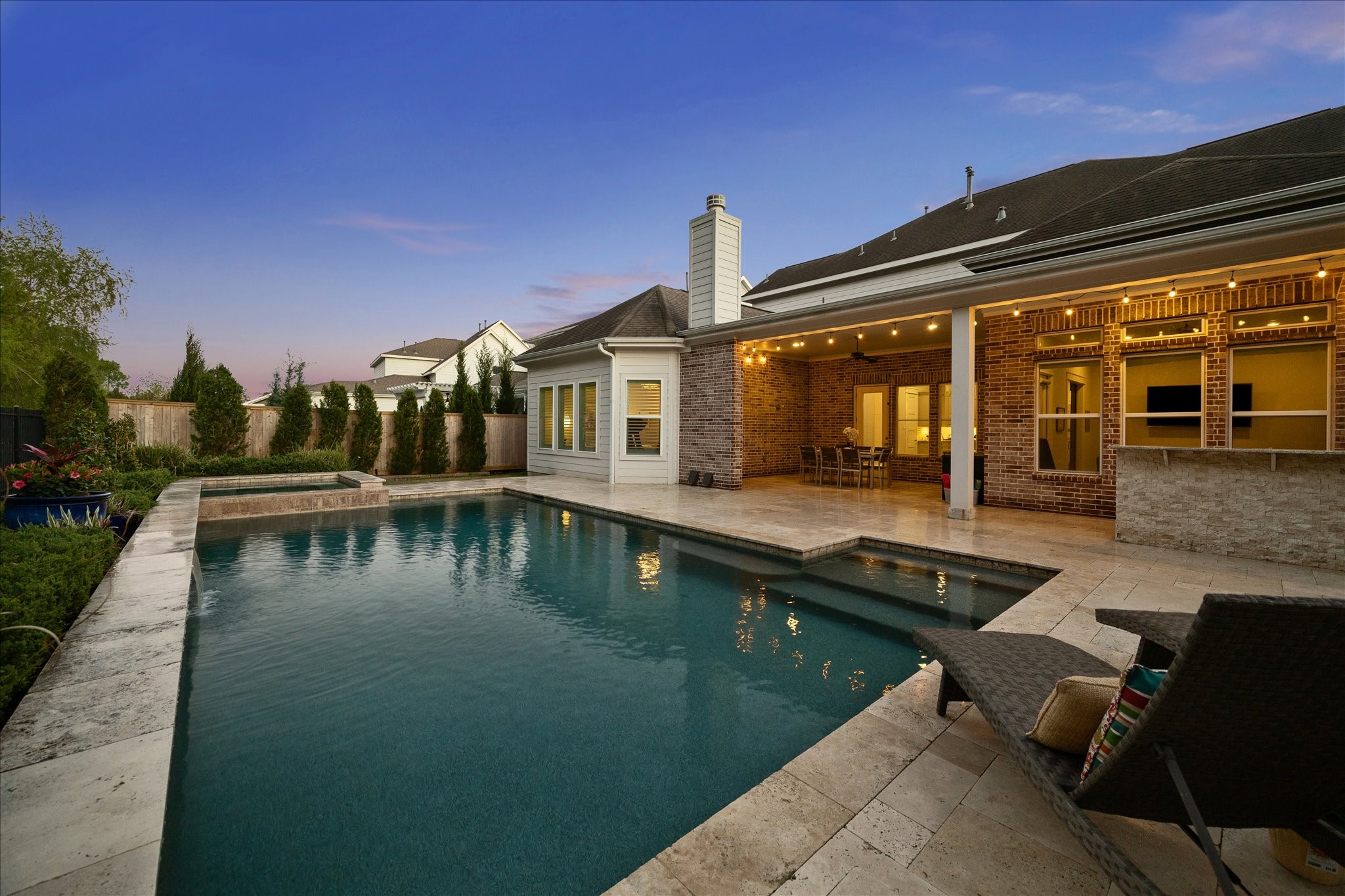 2223 Blue Duck Lane Conroe, TX 77384 - Photo 2 of 38 a view of a house with swimming pool next to a yard