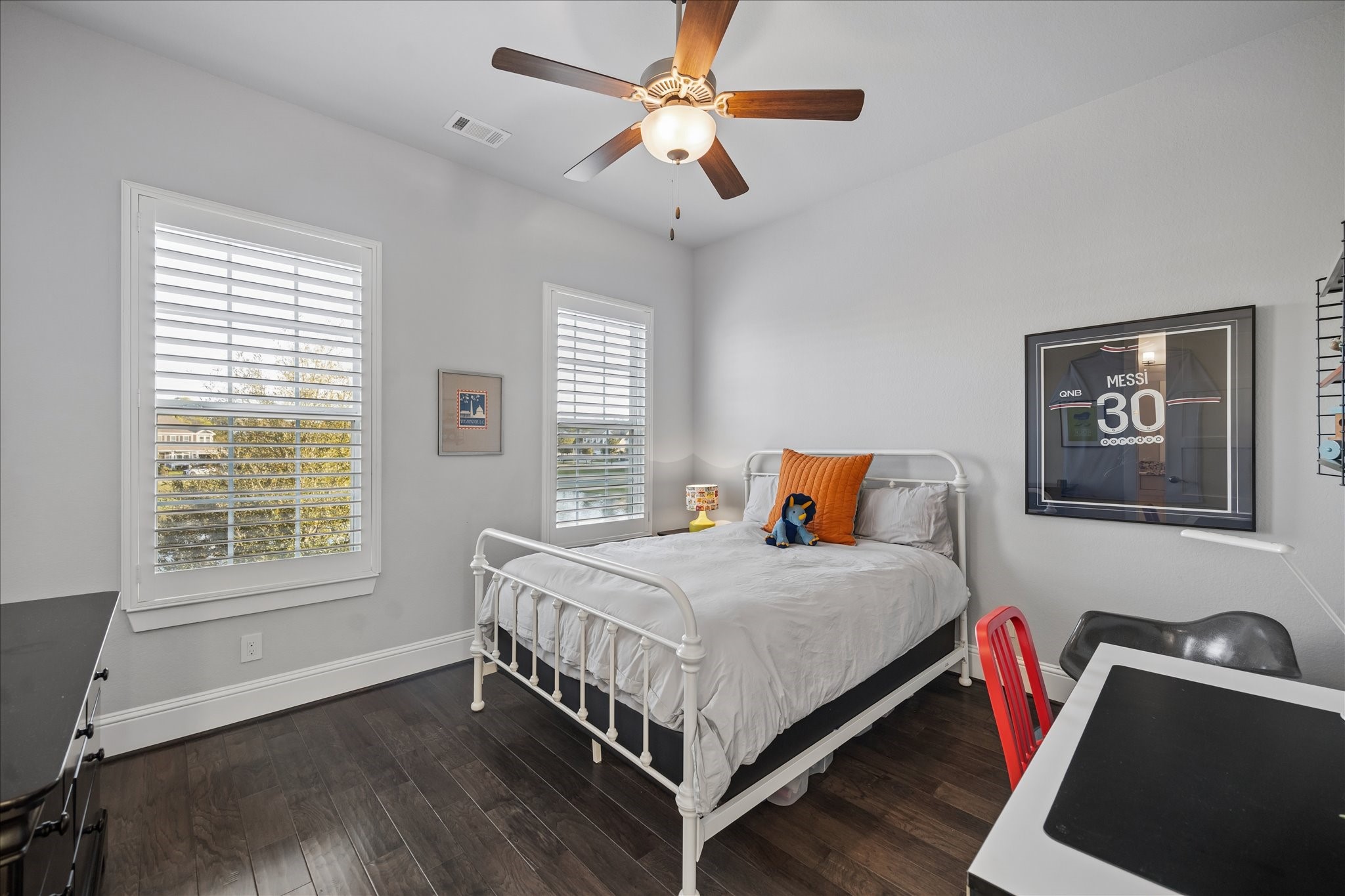 2223 Blue Duck Lane Conroe, TX 77384 - Photo 25 of 38 a bedroom with a bed and a window