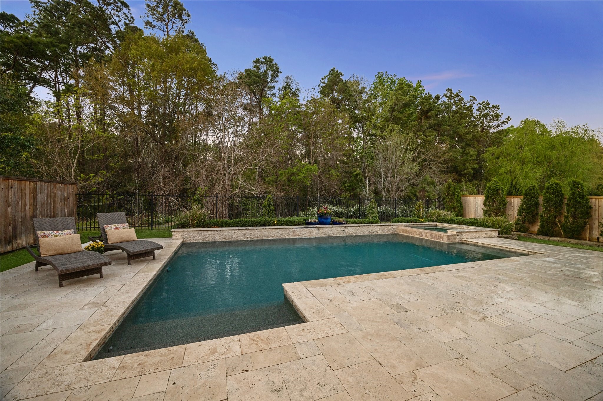 2223 Blue Duck Lane Conroe, TX 77384 - Photo 35 of 38 a view of a swimming pool with a patio