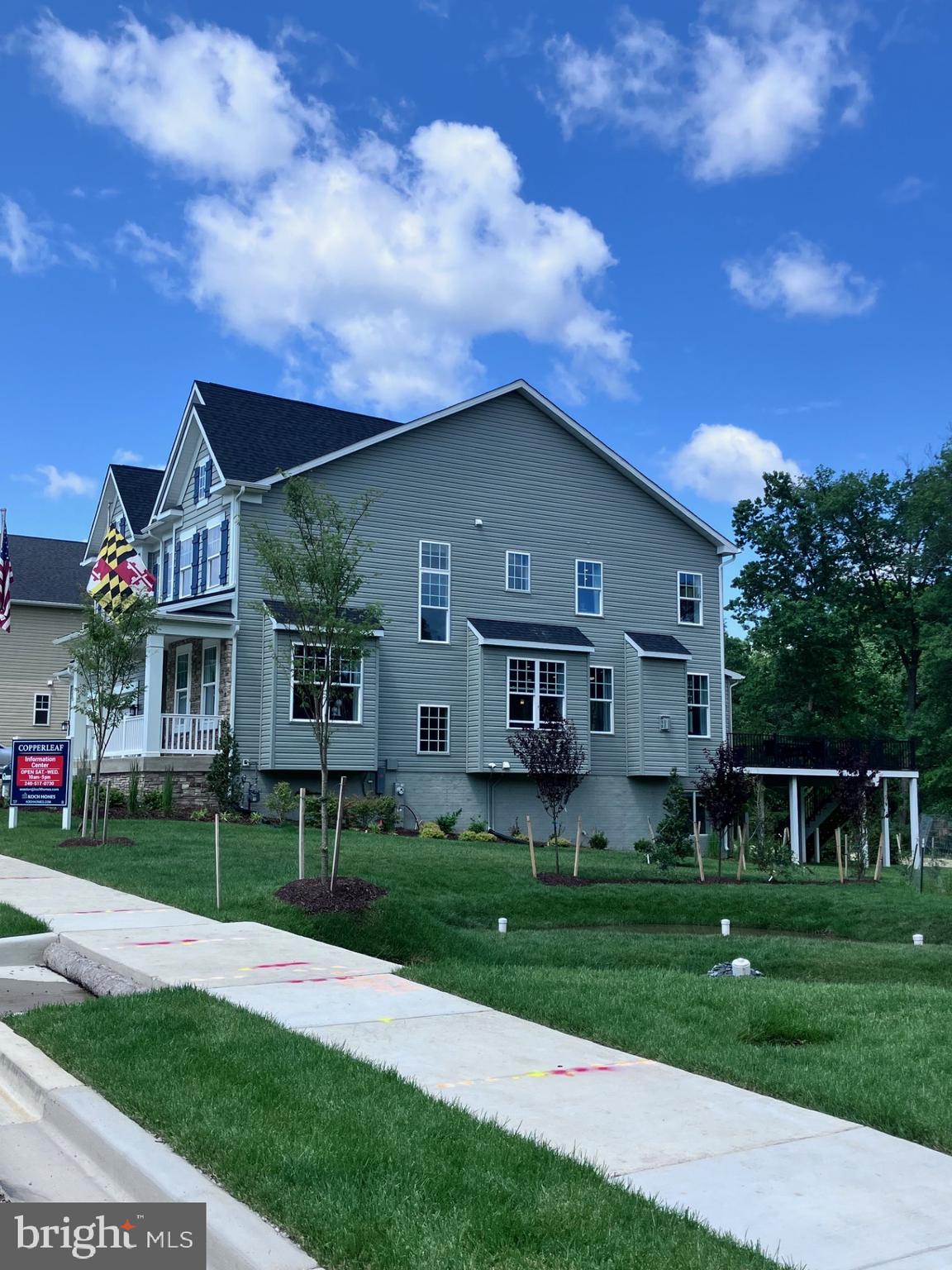 3 Copperleaf Boulevard Hanover, MD 21076 - Photo 2 of 45 a front view of a house with a garden