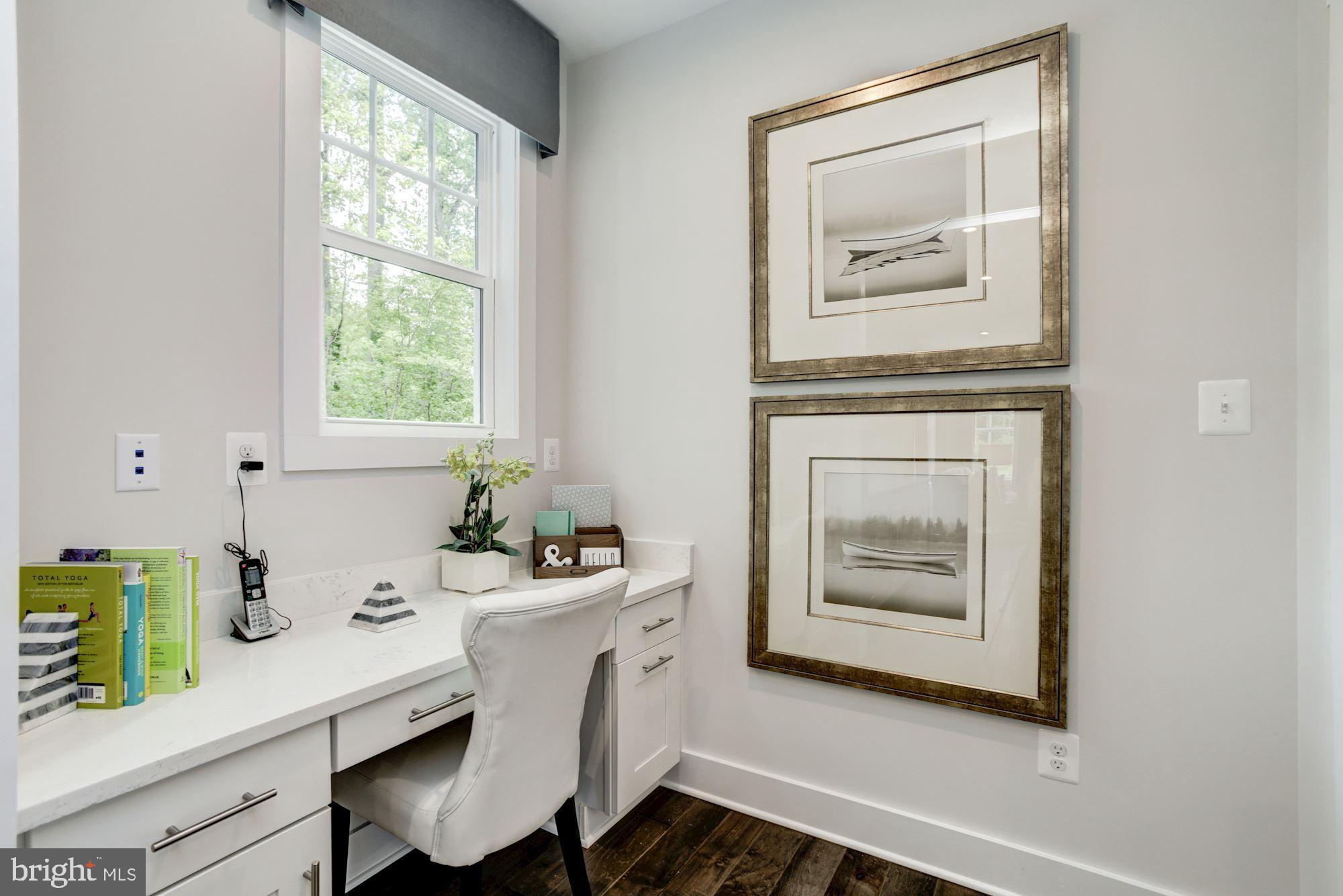 3 Copperleaf Boulevard Hanover, MD 21076 - Photo 22 of 45 a room with a table and a painting on the wall