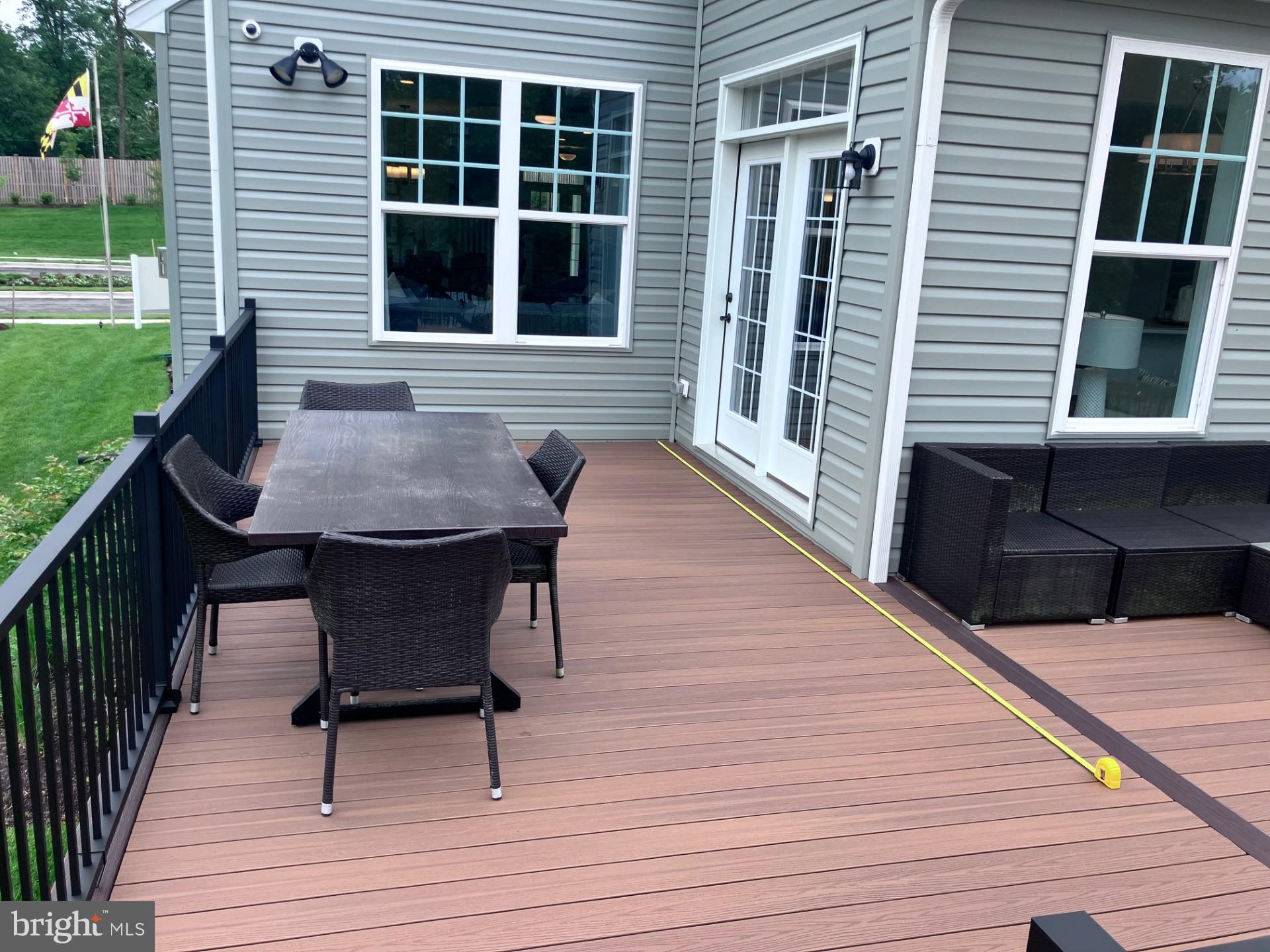 3 Copperleaf Boulevard Hanover, MD 21076 - Photo 5 of 45 a balcony with table and chairs