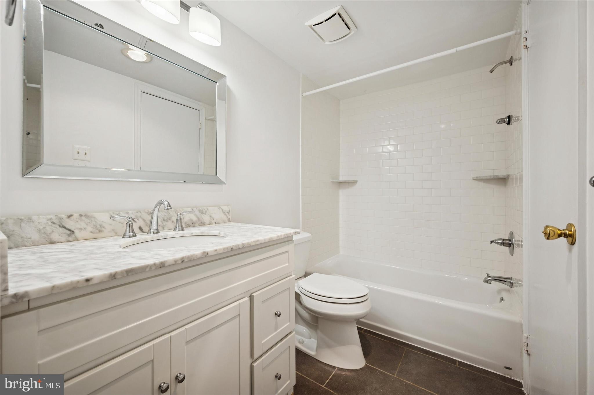 61 Ramsgate Court Blue Bell, PA 19422 - Photo 14 of 20 a bathroom with a granite countertop sink toilet and shower