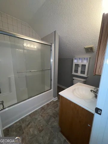 a view of a backyard with plants