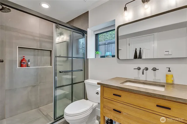 a view of a backyard with sitting area