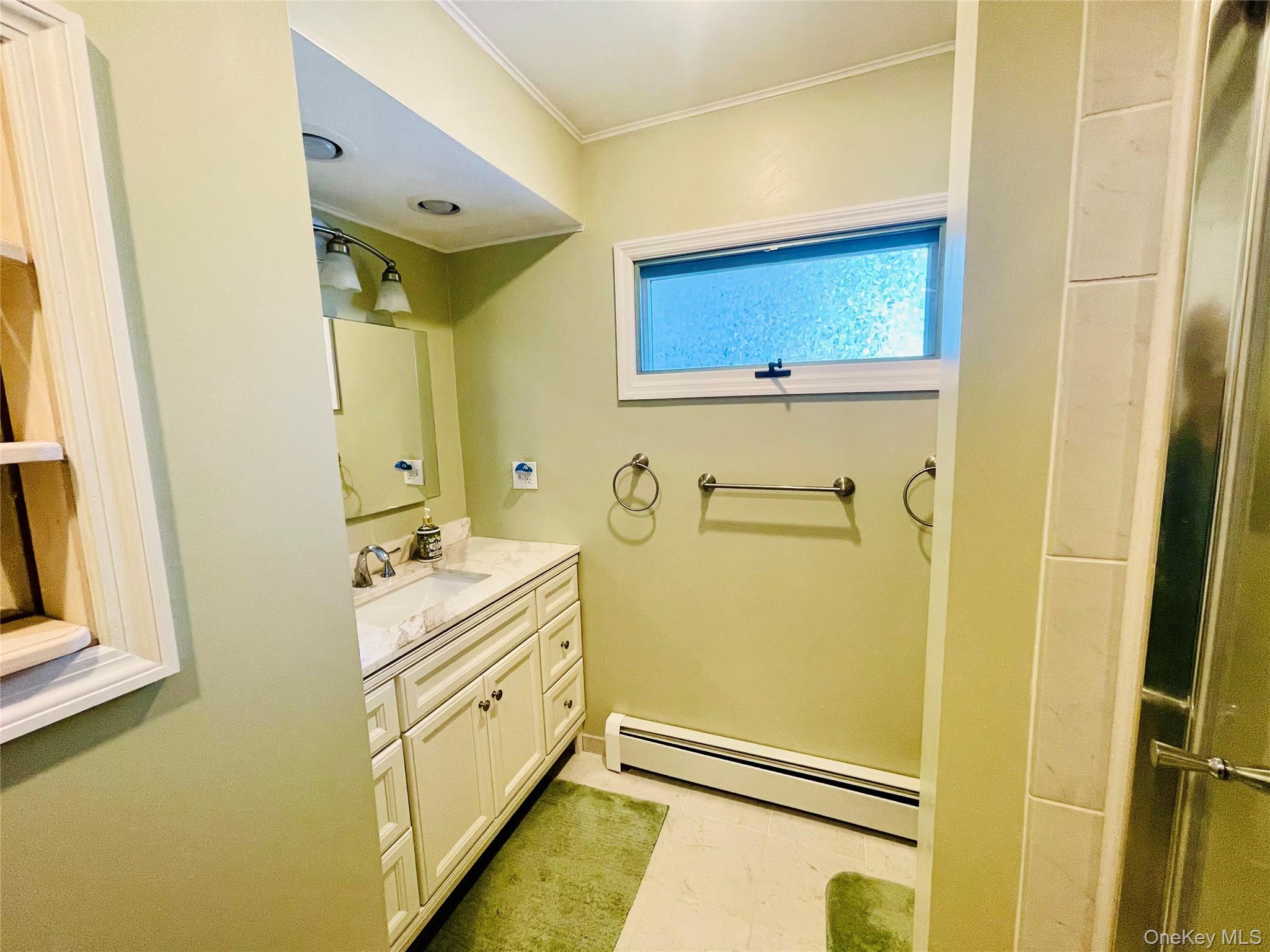 137 Cross Road Goshen, NY 10924 - Photo 24 of 50 a bathroom with a double vanity sink and mirror