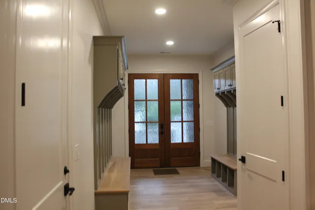 a bathroom with a granite countertop sink mirror and double