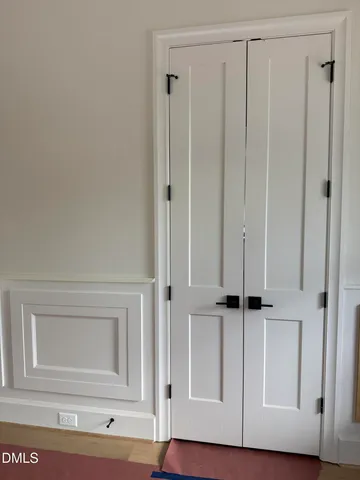 a bathroom with a window and a shower