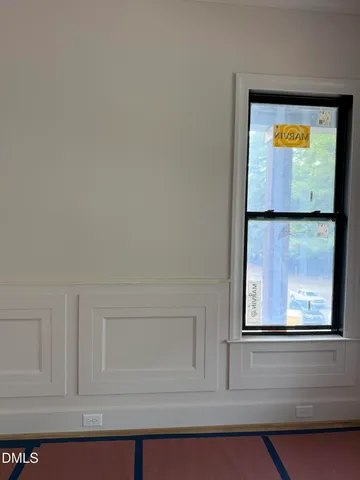 a view of storage and utility room with closet