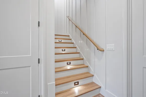 a kitchen with stainless steel appliances granite countertop a stove and cabinets