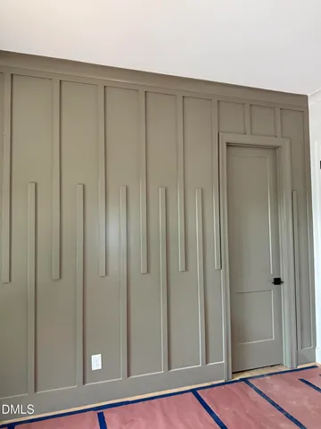 a view of a house with large windows