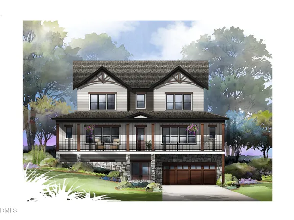 a view of an empty room with wooden floor and a kitchen