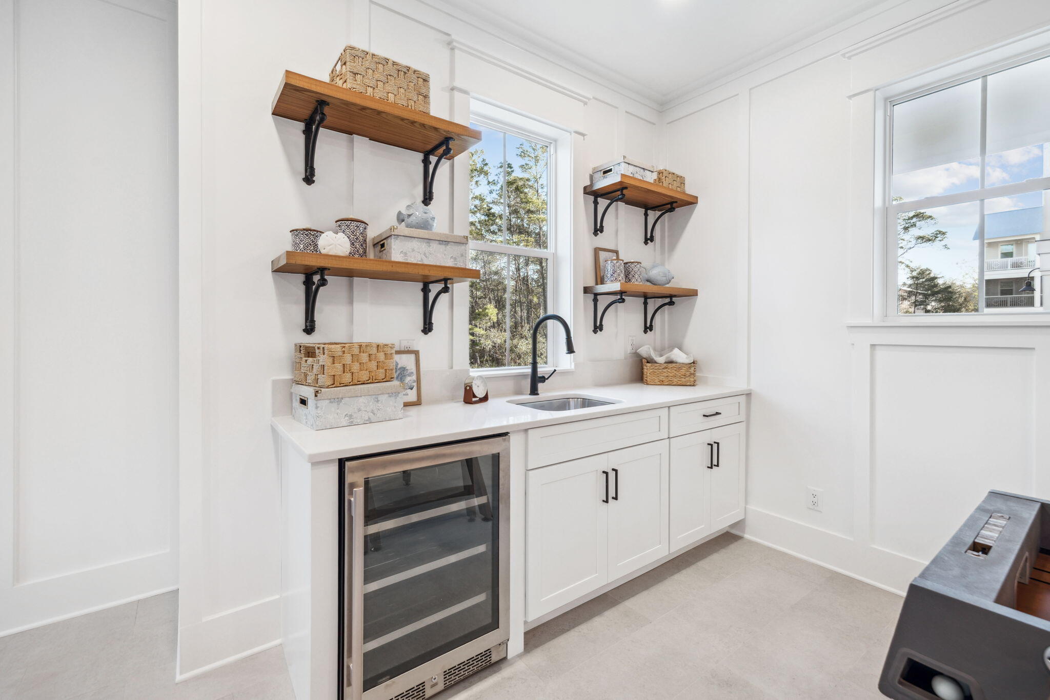 200 Grayton Boulevard Santa Rosa Beach, FL 32459 - Photo 13 of 50 a room with a sink and a mirror