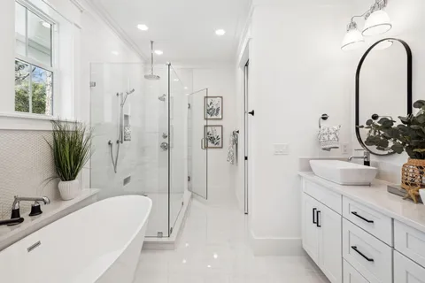 a bathroom with a bathtub and a sink