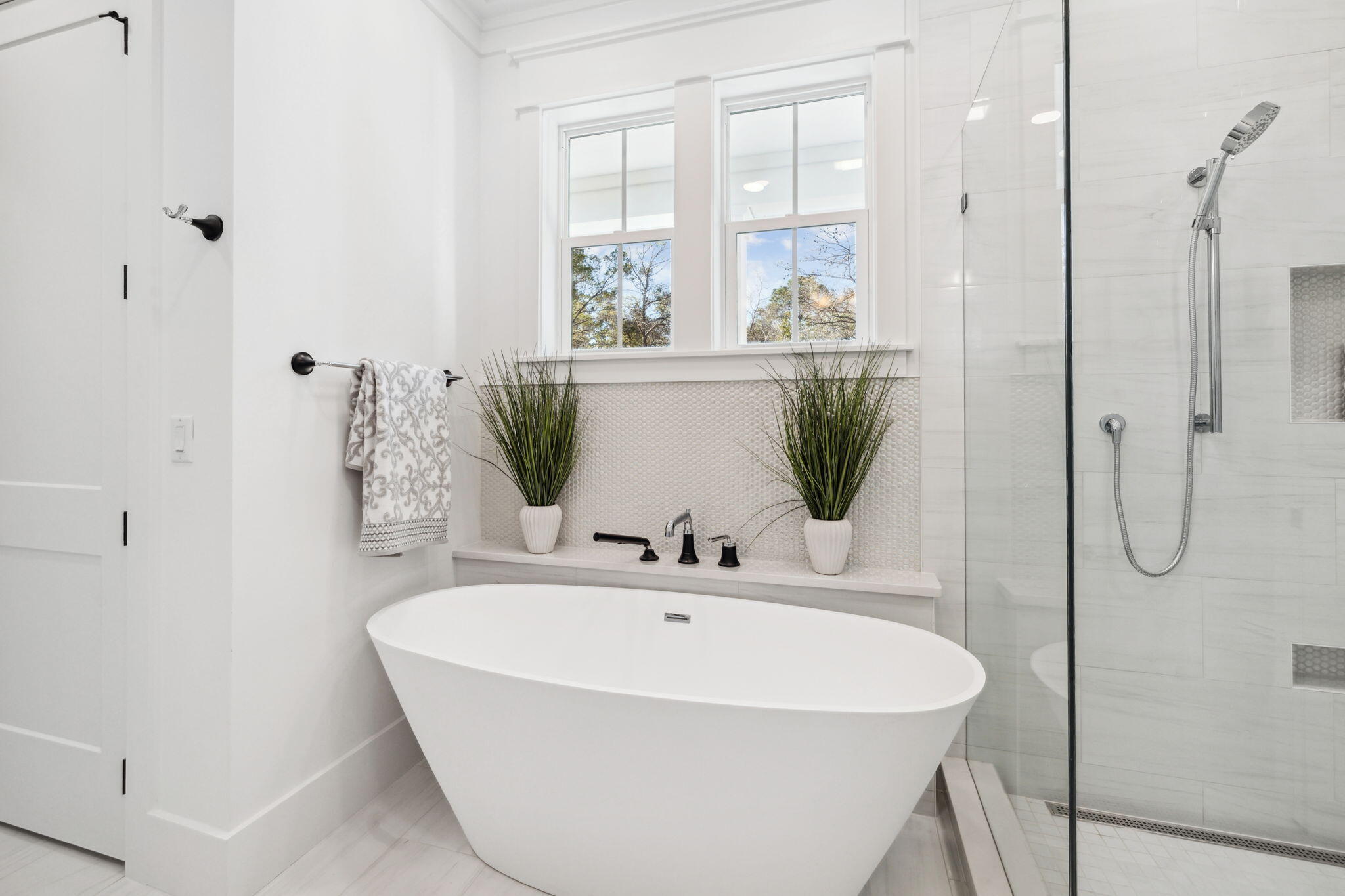 200 Grayton Boulevard Santa Rosa Beach, FL 32459 - Photo 17 of 50 a bathroom with a bathtub and a sink