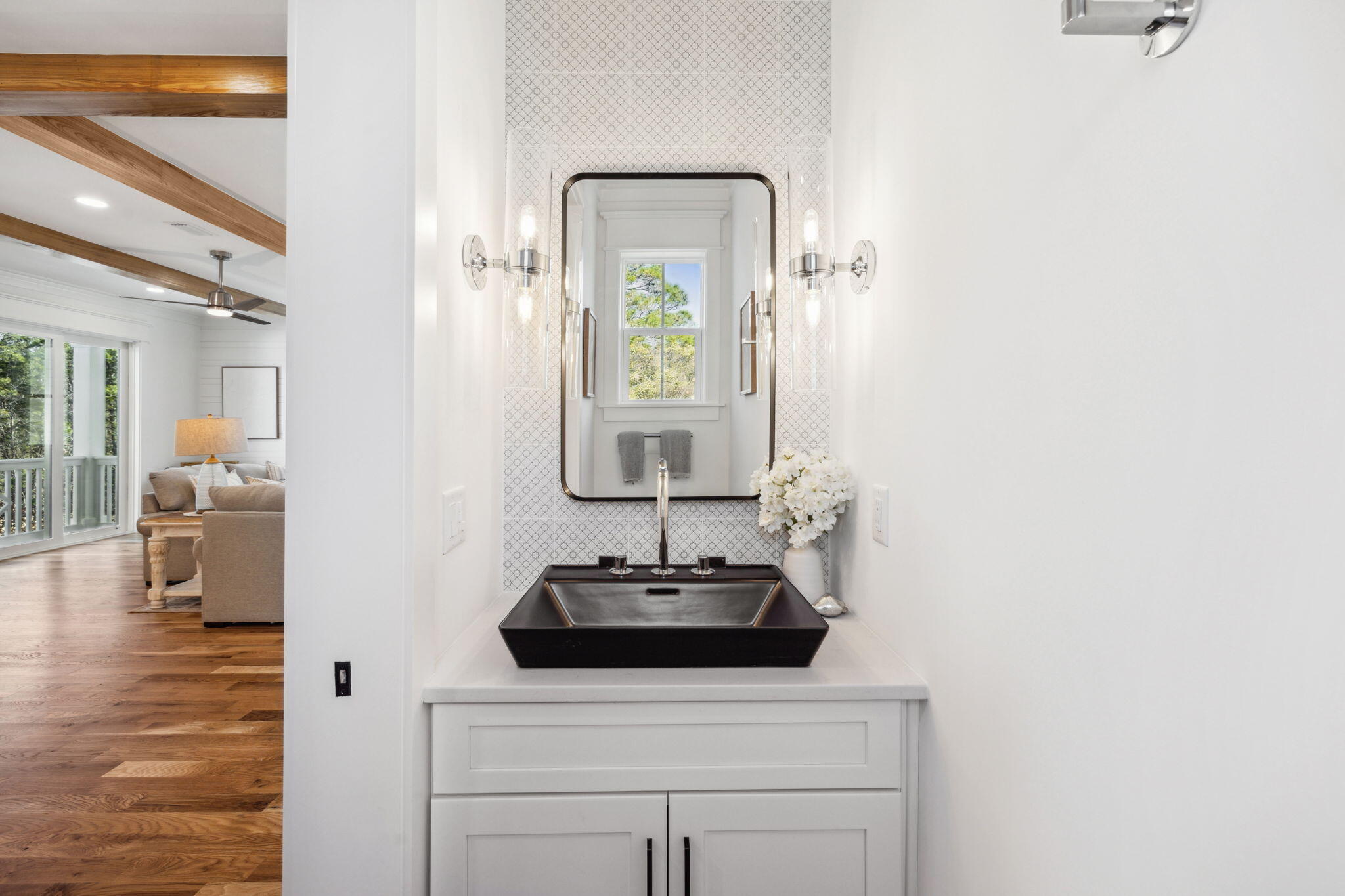 200 Grayton Boulevard Santa Rosa Beach, FL 32459 - Photo 27 of 50 a bathroom with a sink and a mirror