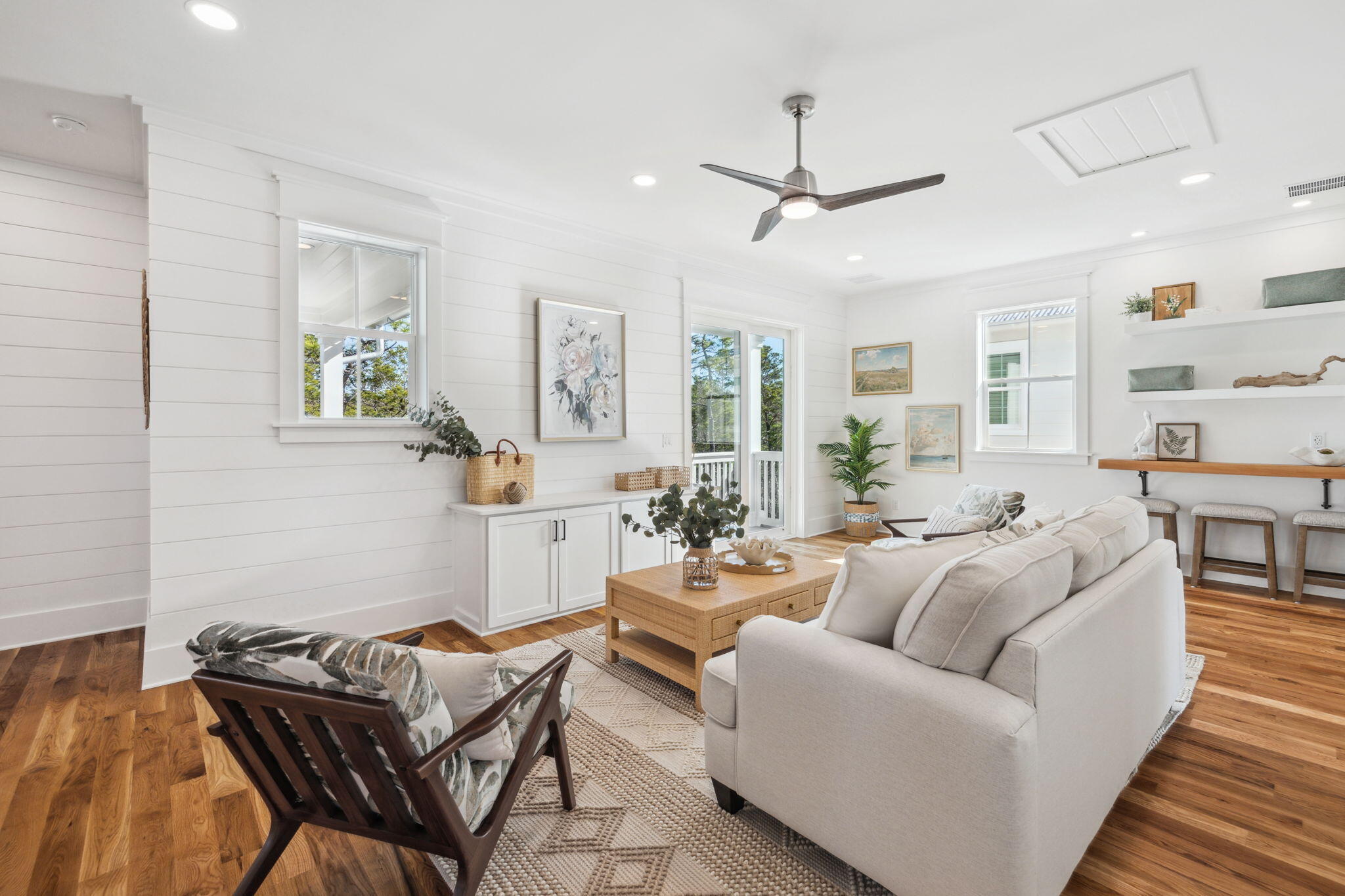 200 Grayton Boulevard Santa Rosa Beach, FL 32459 - Photo 31 of 50 a living room with furniture and a wooden floor