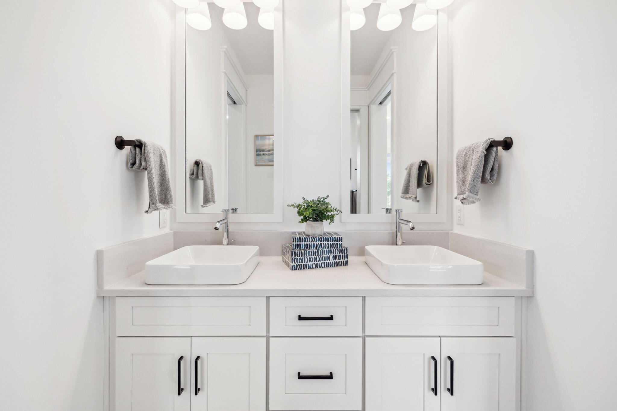 200 Grayton Boulevard Santa Rosa Beach, FL 32459 - Photo 36 of 50 a bathroom with double sink and a mirror