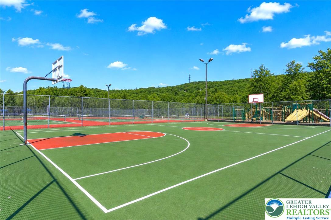 1007 Hampstead Road Bushkill, PA 18324 - Photo 65 of 72 Multi-sport courts and a playground create an active community hub under open skies.