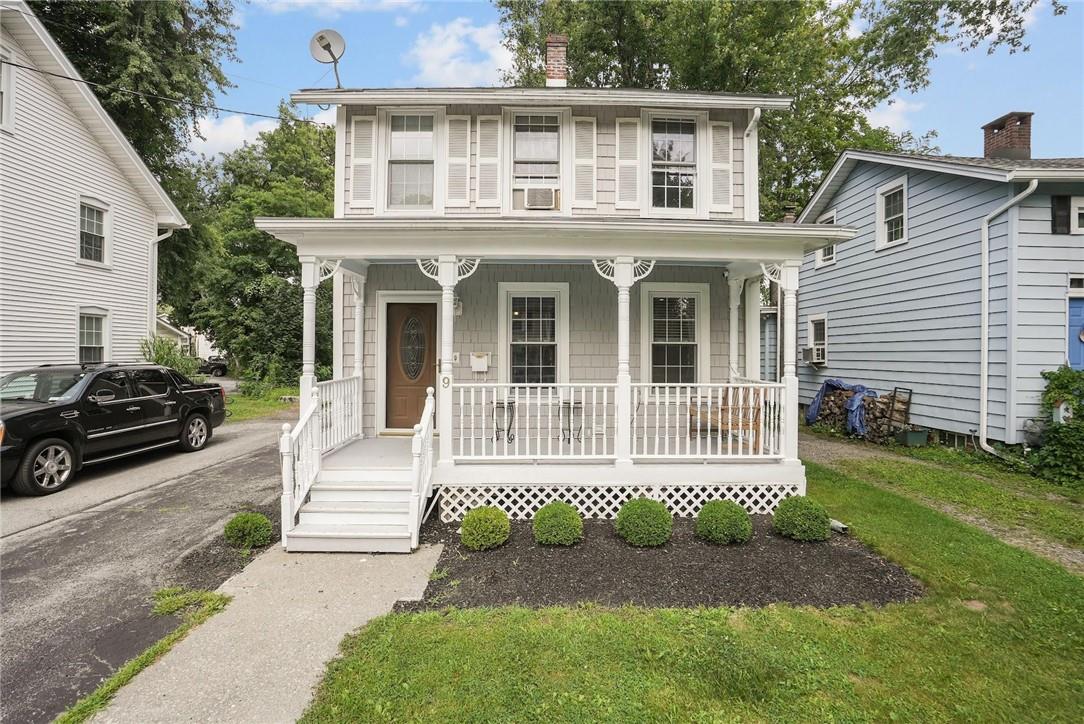 9 Robinson Street Fishkill, NY 12524 - Photo 1 of 1 a front view of a house with a garden