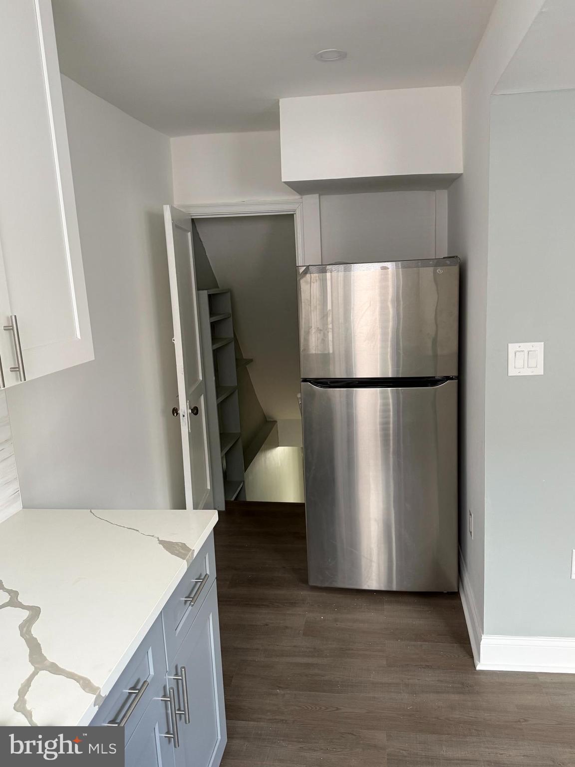 1353 Fanshawe Street Philadelphia, PA 19111 - Photo 12 of 41 a kitchen with a refrigerator and a sink