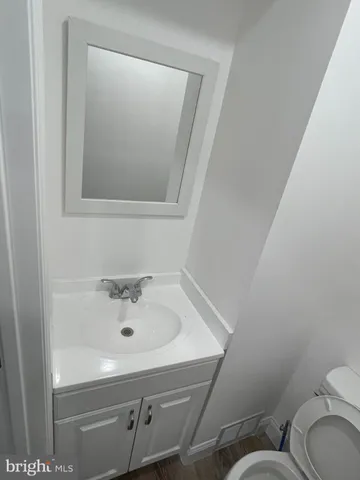 a view of kitchen with wooden floor