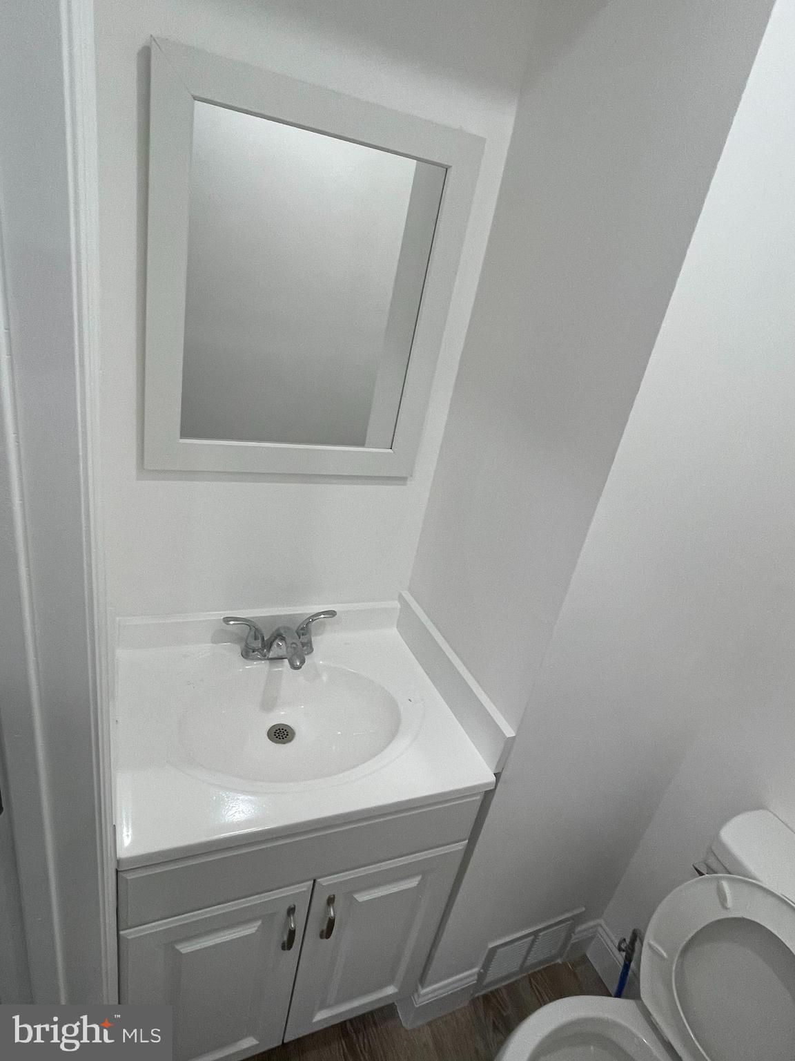 1353 Fanshawe Street Philadelphia, PA 19111 - Photo 6 of 41 a bathroom with a sink and mirror