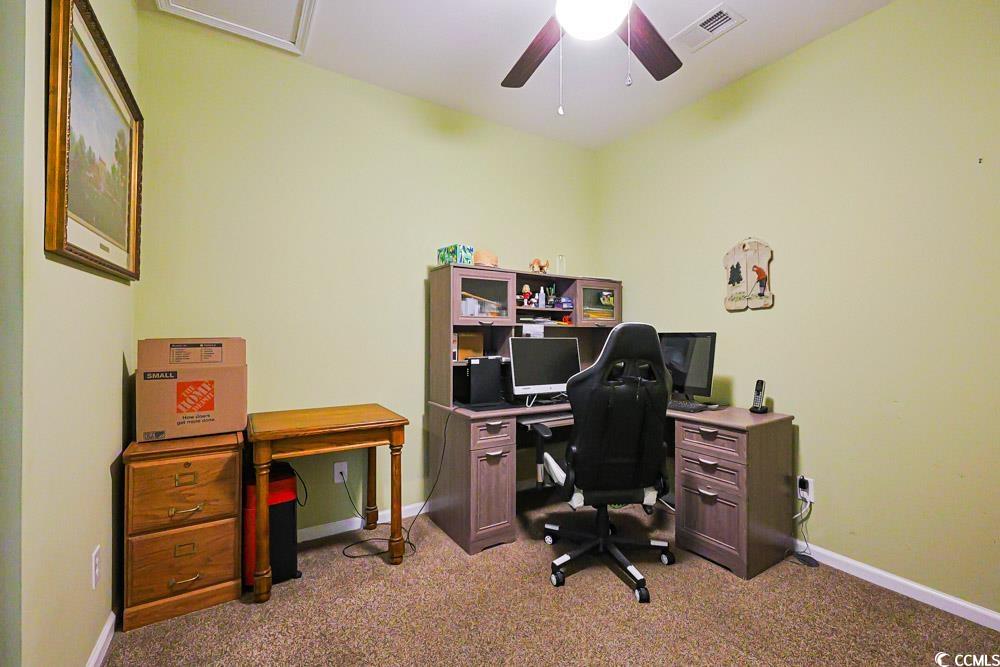 75 Field Planters Circle, Unit 75 Calabash, NC 28467 - Photo 23 of 40 Office area featuring light colored carpet and a ceiling fan